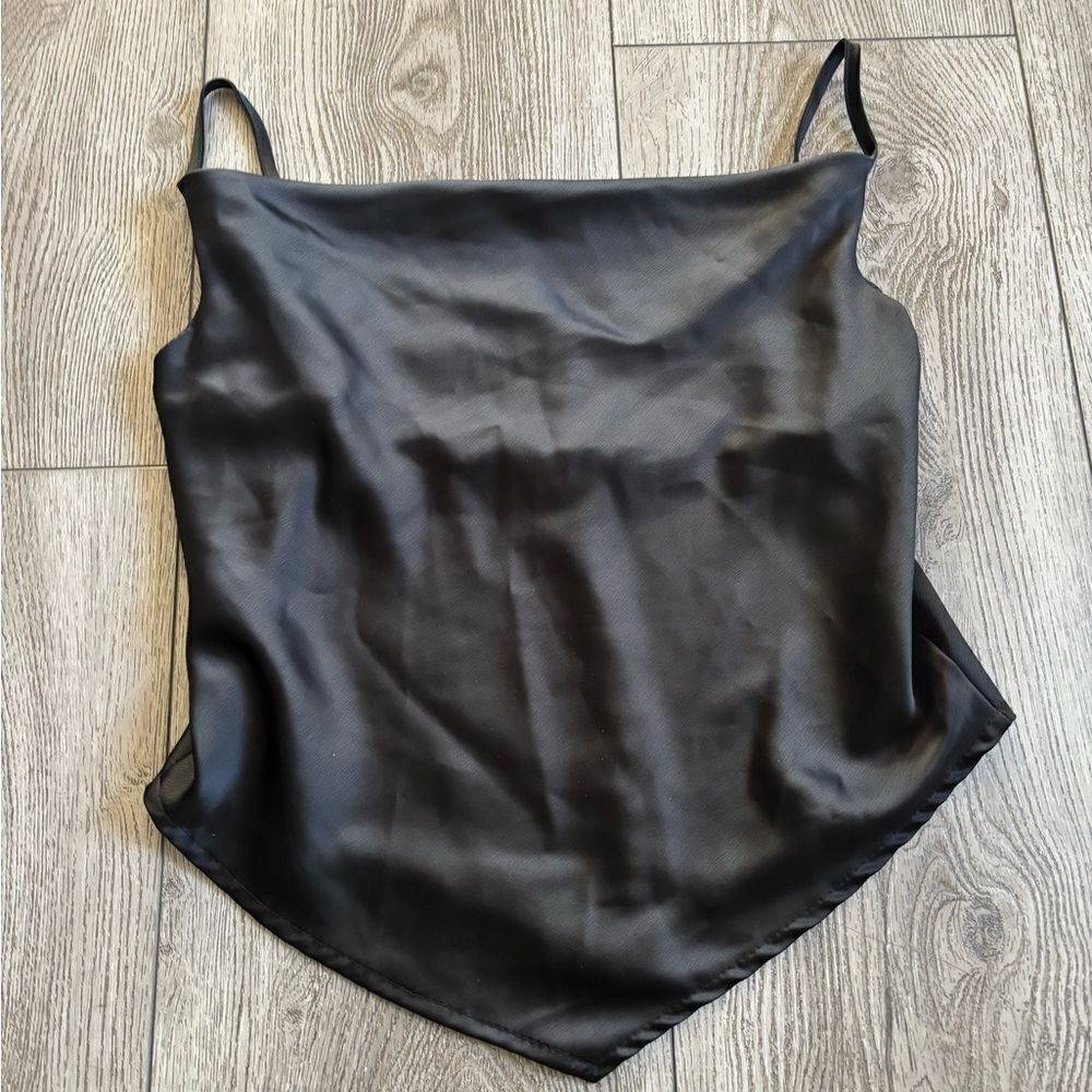 Glam woman’s used spaghetti top